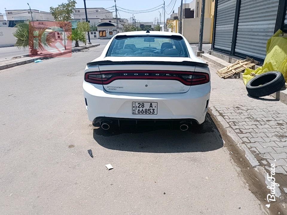 دۆج چارجەر